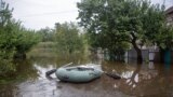 Частный сектор города Кривой Рог Днепропетровской области после российского ракетного удара по дамбе местного водохранилища. 15 сентября 2022 г.