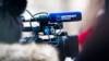 RUSSIA – Camera with microphone of a russian tv company Nastoyaschye vremya (eng. Current Time / Real time) on a march of Boris Nemtsov. Moscow, February 25, 2018