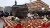 RUSSIA -- People take part in an annual ceremony honoring the memory of thousands of men and women executed by the Soviet authorities during Josef Stalin's Great Terror, at the Solovetsky Kamen (Solovki Stone) memorial on Lubyanka Square, in Moscow, Octob